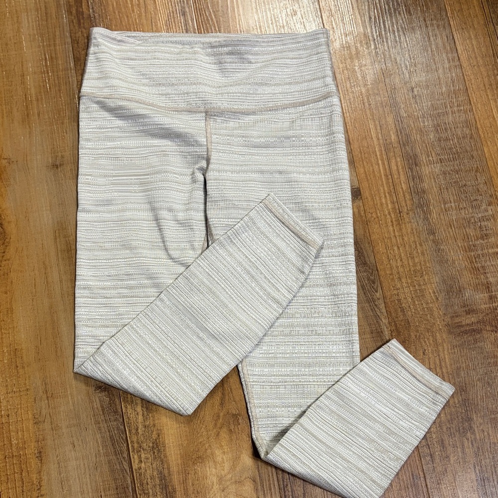 Athleta 2 pairs of Striped Leggings tan/cream and white/Light Blue size small